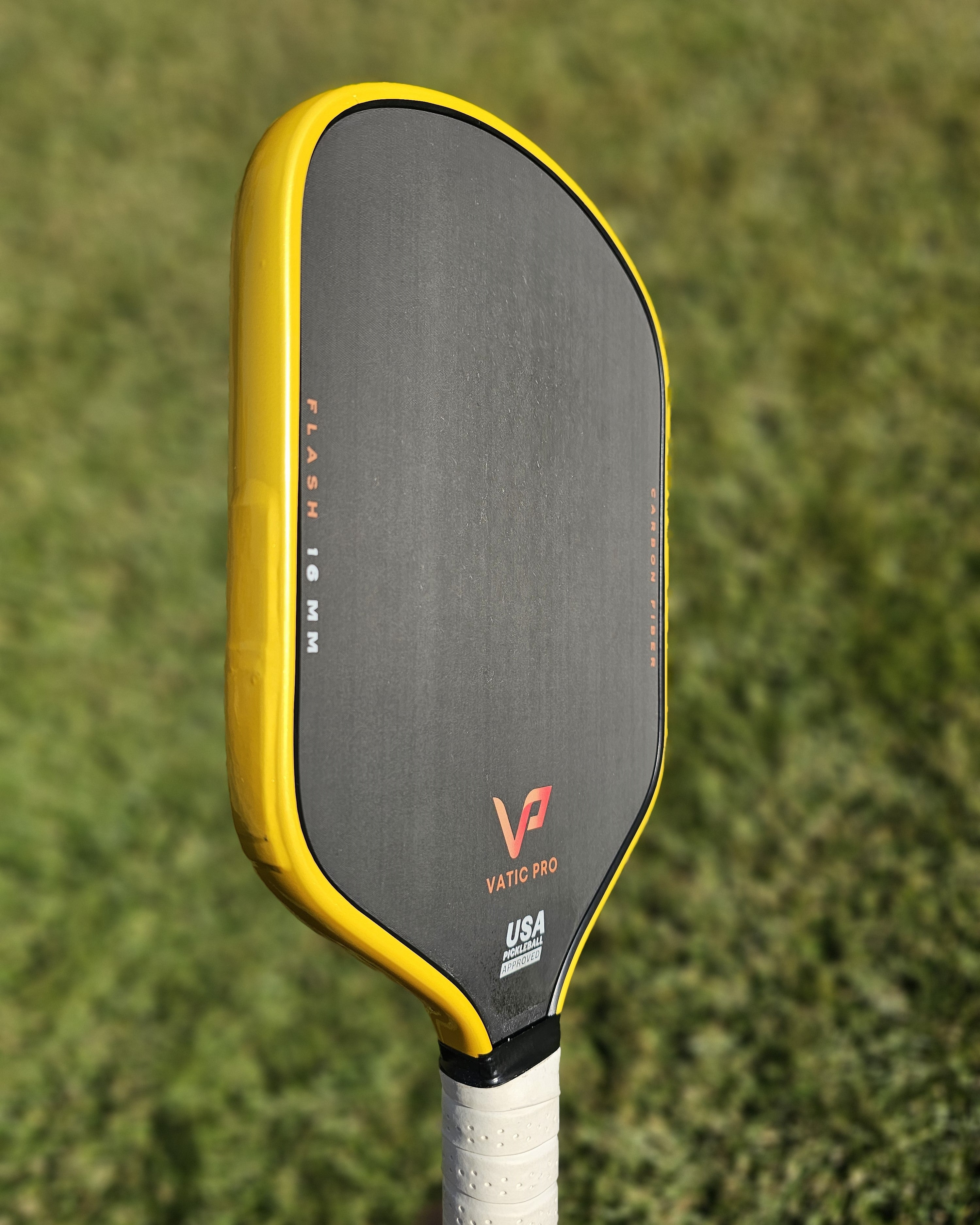 Vatic Pro pickleball paddle with yellow metallic edge tape