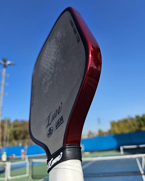 Luzz Cannon picklball paddle with Red Metallic edge tape