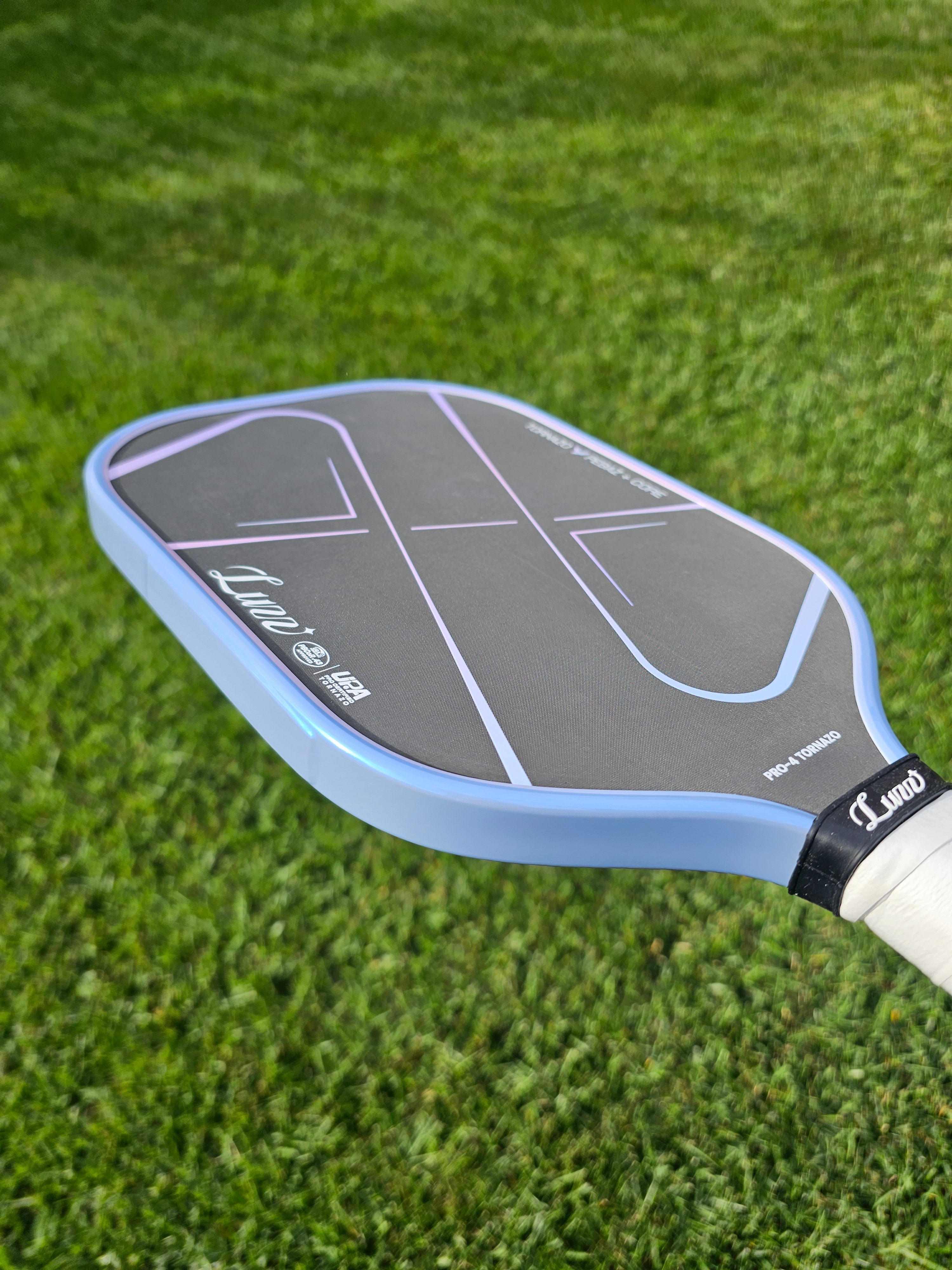 Luzz Tornazo pickleball paddle with Grey/Blue edge tape