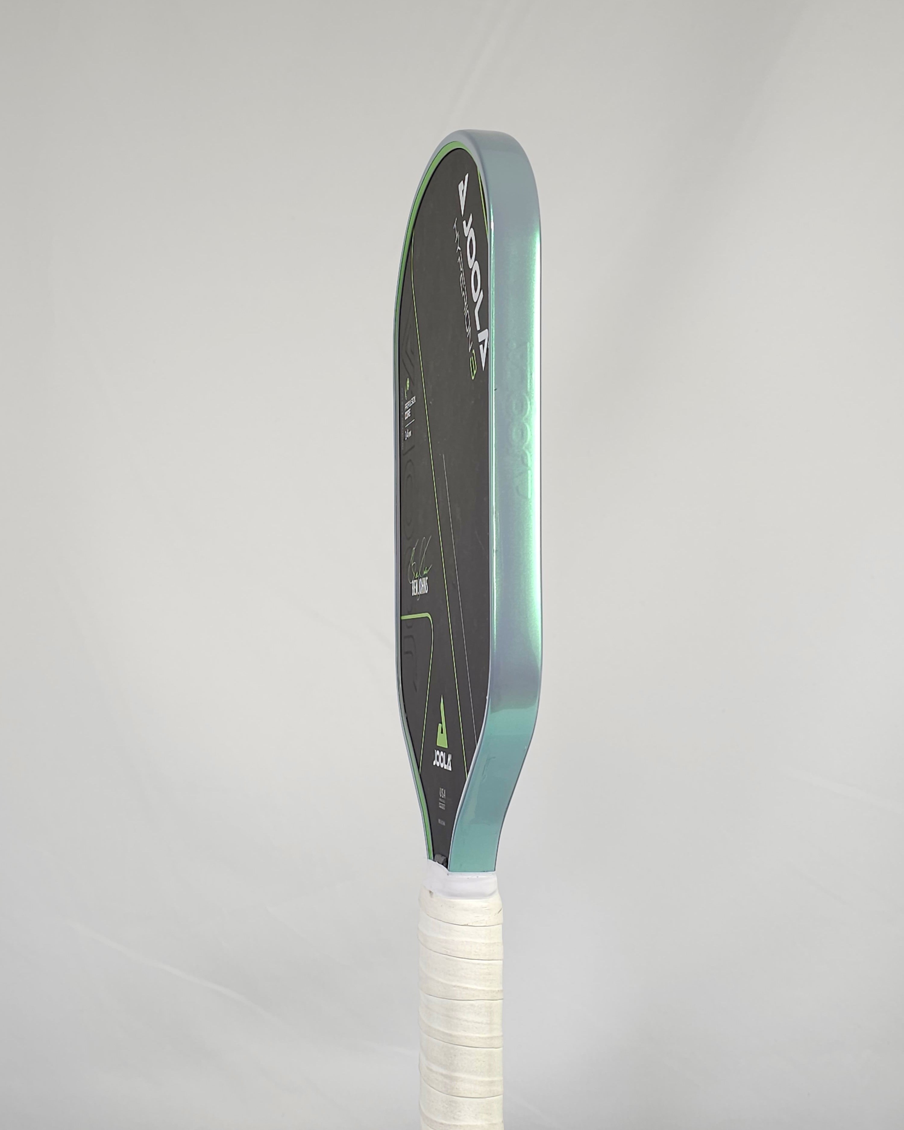 Joola pickleball paddle with grey/green edge tape