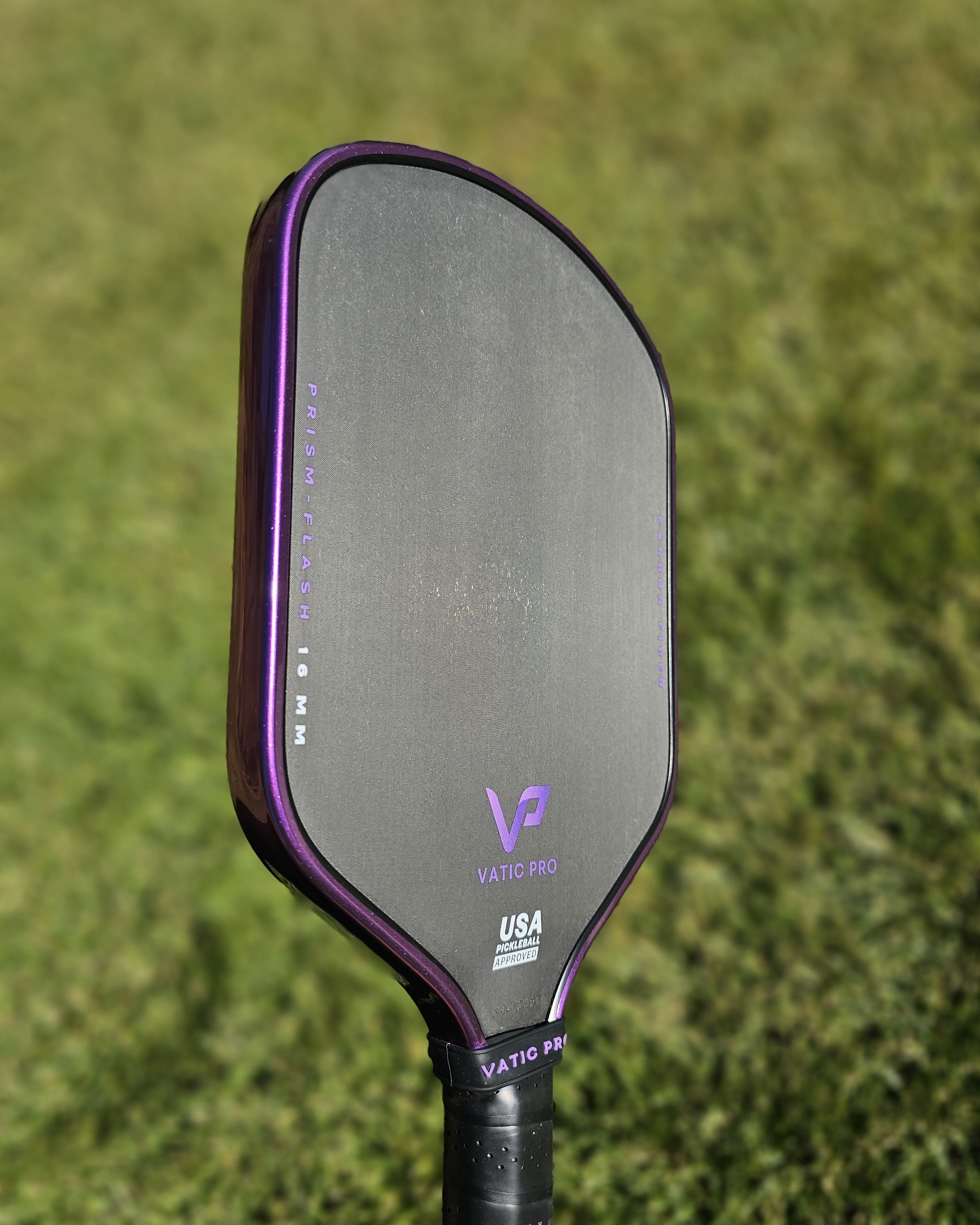 Vatic Pro Prism pickleball paddle with purple metallic edge tape