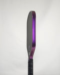 Pickleball paddle with purple metallic edge tape
