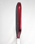 Edge view of a pickleball paddle with #48 Red Candy Metallic edge tape installed