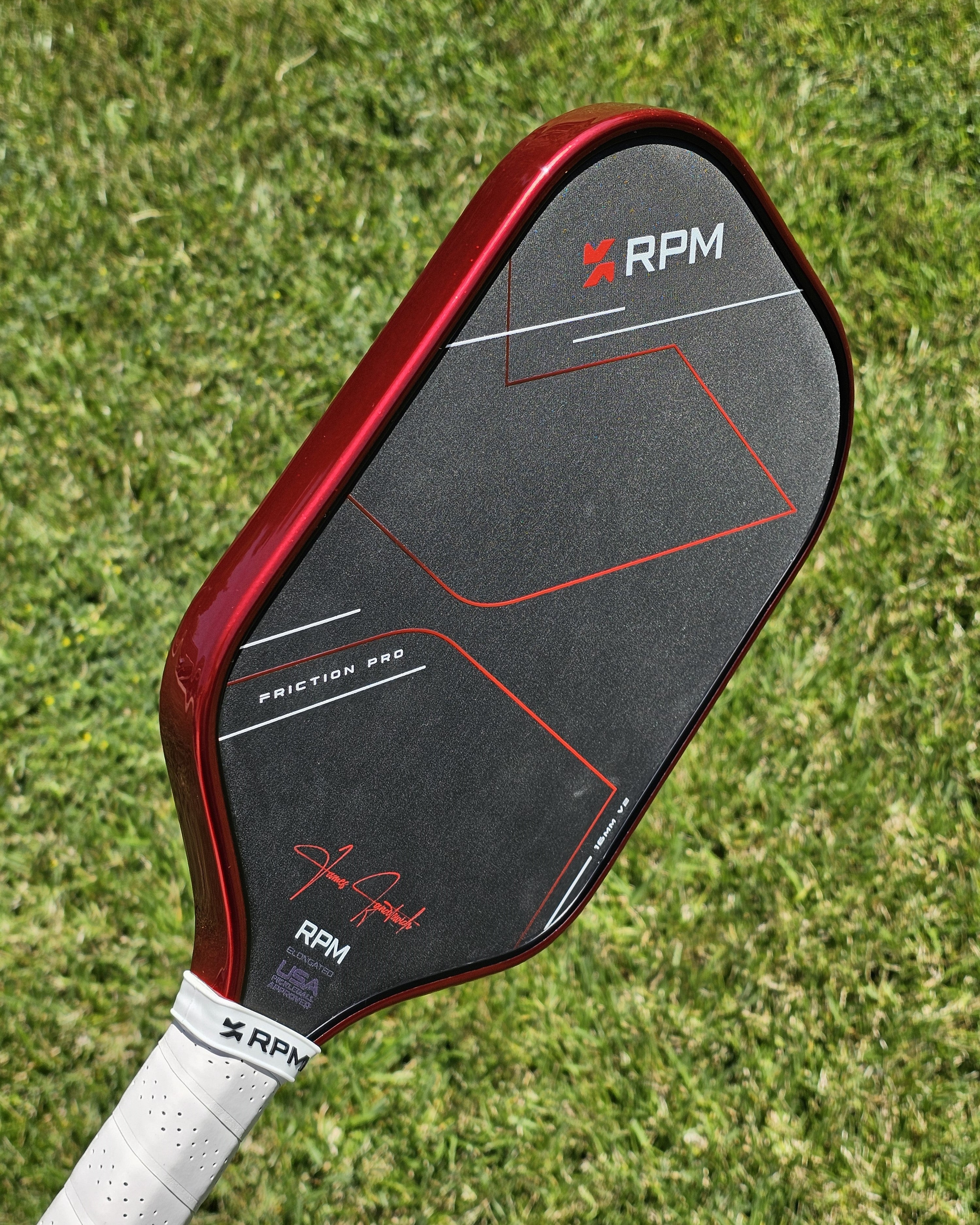 RPM Pickleball paddle with #48 Red Candy Metallic edge tape installed