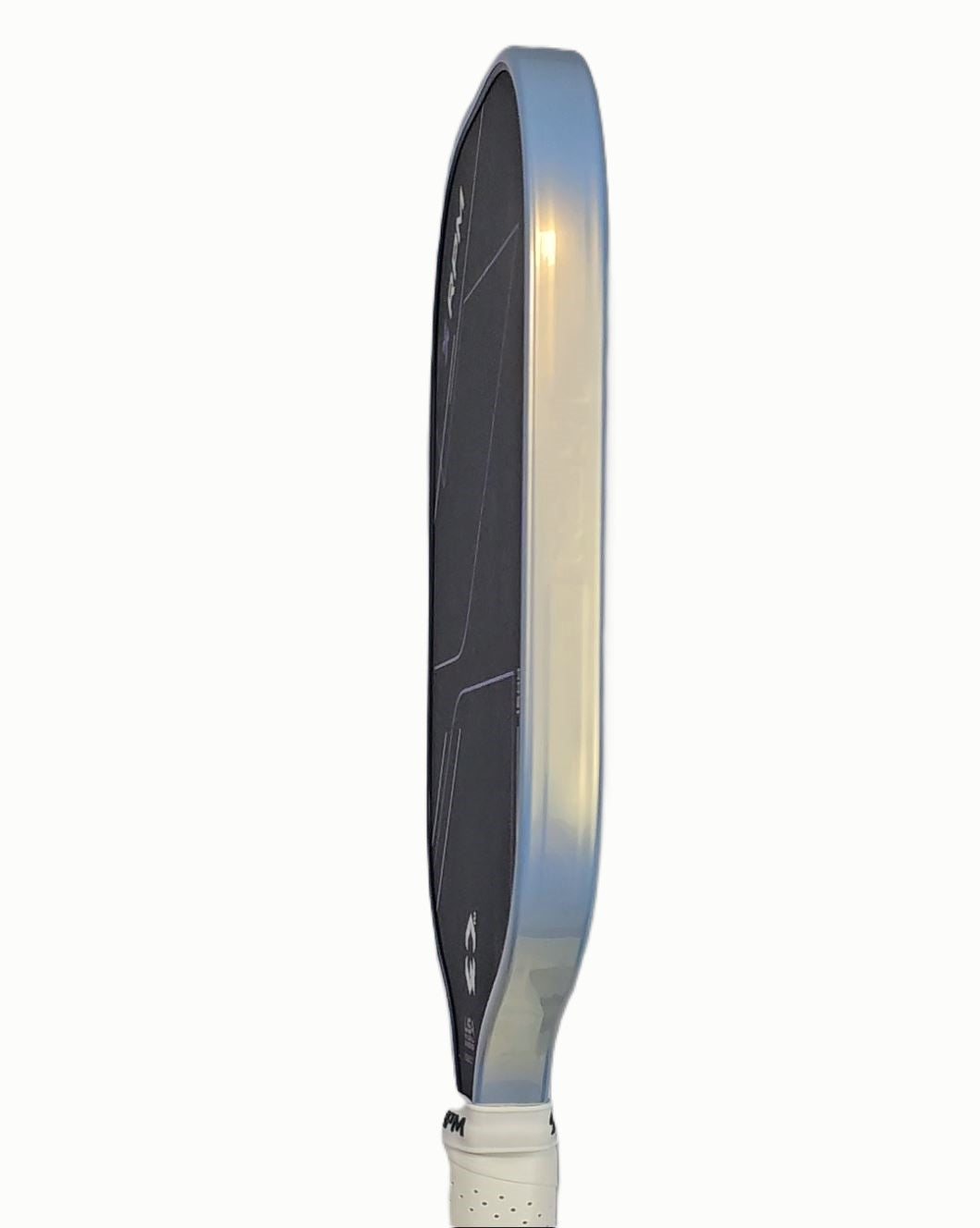 Close up edge view of a pickleball paddle showing the installed platinum and gold protective edge guard tape
