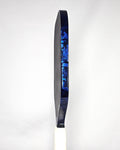 Edgeless pickleball paddle with blue forged carbon edge tape