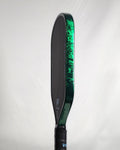 Pickleball paddle with Green Damascus edge tape installed