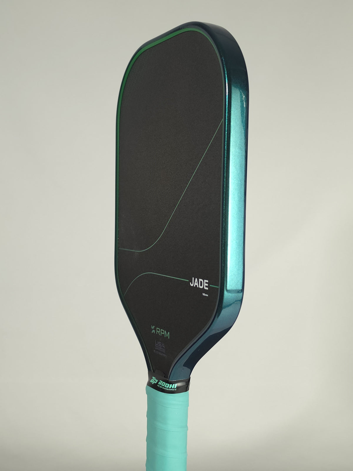 RPM Jade pickleball paddle with teal jade metallic edge tape