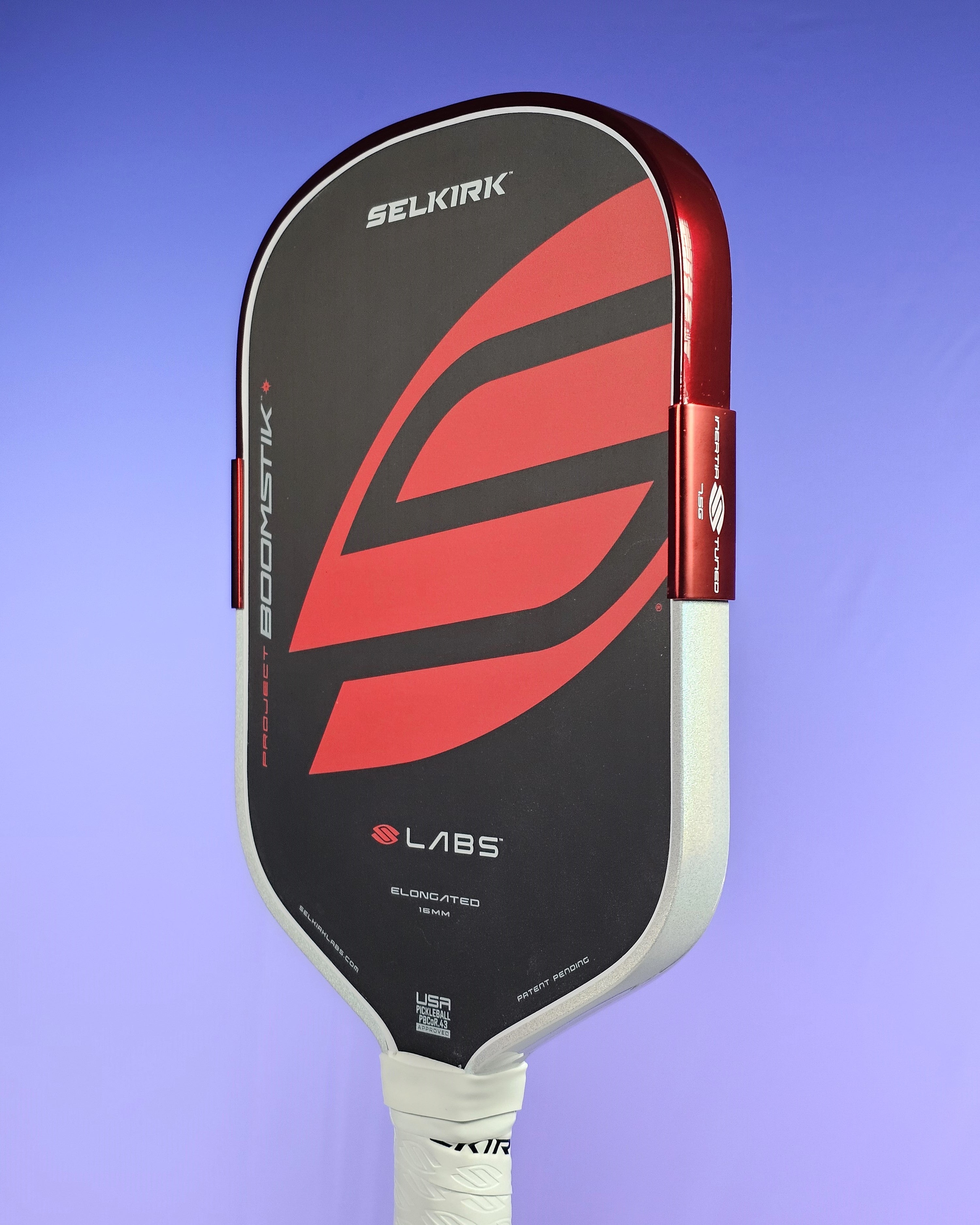 Selkirk Boomstik paddle with 2-tone Red Metallic and White Prism edge tape